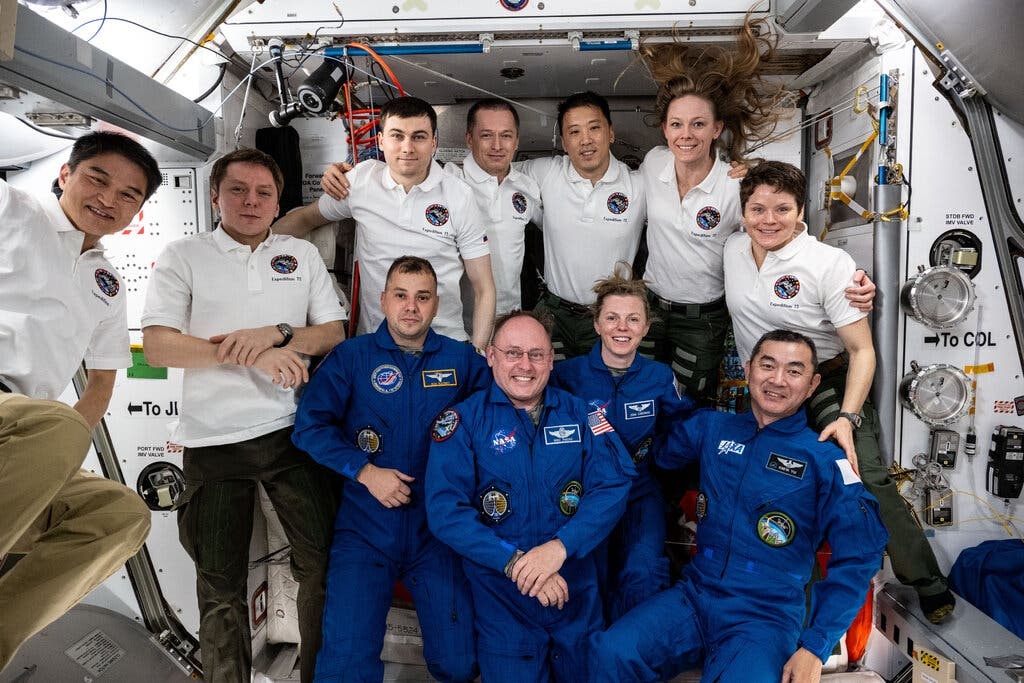 Crew members inside the International Space Station